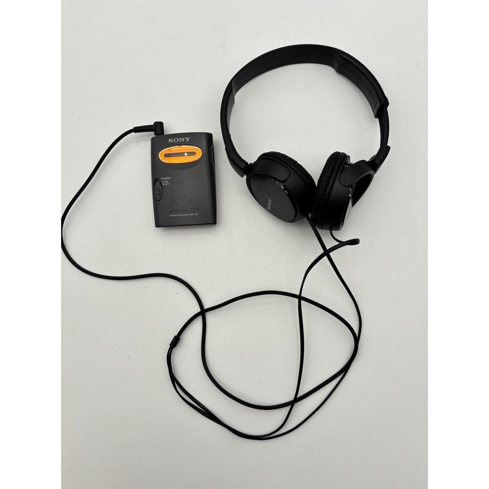 Sony Walkman SRF-59 FM/AM Vintage Portable Radio With Sony Headphones Works.